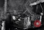 Image of molten steel poured into engine block molds Michigan United States USA, 1938, second 48 stock footage video 65675030010