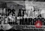 Image of Radio broadcasts inform Americans about Japanese attack on Pearl Harbor United States USA, 1942, second 10 stock footage video 65675030021