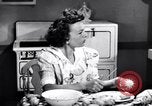 Image of Radio broadcasts inform Americans about Japanese attack on Pearl Harbor United States USA, 1942, second 20 stock footage video 65675030021