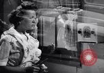 Image of Radio broadcasts inform Americans about Japanese attack on Pearl Harbor United States USA, 1942, second 26 stock footage video 65675030021