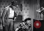 Image of Radio broadcasts inform Americans about Japanese attack on Pearl Harbor United States USA, 1942, second 33 stock footage video 65675030021