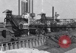 Image of Ford River Rouge Plant raw material storage Dearborn Michigan USA, 1927, second 1 stock footage video 65675030033