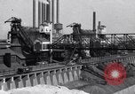 Image of Ford River Rouge Plant raw material storage Dearborn Michigan USA, 1927, second 5 stock footage video 65675030033