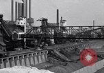 Image of Ford River Rouge Plant raw material storage Dearborn Michigan USA, 1927, second 9 stock footage video 65675030033