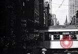 Image of busy city street with pedestrian traffic Detroit Michigan USA, 1926, second 5 stock footage video 65675030056