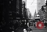 Image of busy city street with pedestrian traffic Detroit Michigan USA, 1926, second 6 stock footage video 65675030056