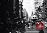 Image of busy city street with pedestrian traffic Detroit Michigan USA, 1926, second 7 stock footage video 65675030056
