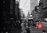 Image of busy city street with pedestrian traffic Detroit Michigan USA, 1926, second 8 stock footage video 65675030056