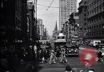 Image of busy city street with pedestrian traffic Detroit Michigan USA, 1926, second 9 stock footage video 65675030056
