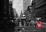 Image of busy city street with pedestrian traffic Detroit Michigan USA, 1926, second 10 stock footage video 65675030056
