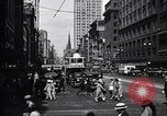 Image of busy city street with pedestrian traffic Detroit Michigan USA, 1926, second 11 stock footage video 65675030056