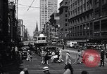 Image of busy city street with pedestrian traffic Detroit Michigan USA, 1926, second 12 stock footage video 65675030056