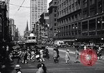 Image of busy city street with pedestrian traffic Detroit Michigan USA, 1926, second 13 stock footage video 65675030056