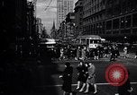 Image of busy city street with pedestrian traffic Detroit Michigan USA, 1926, second 19 stock footage video 65675030056
