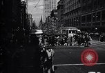 Image of busy city street with pedestrian traffic Detroit Michigan USA, 1926, second 20 stock footage video 65675030056