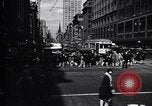 Image of busy city street with pedestrian traffic Detroit Michigan USA, 1926, second 21 stock footage video 65675030056