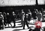 Image of busy city street with pedestrian traffic Detroit Michigan USA, 1926, second 28 stock footage video 65675030056