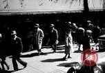 Image of busy city street with pedestrian traffic Detroit Michigan USA, 1926, second 29 stock footage video 65675030056