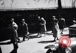 Image of busy city street with pedestrian traffic Detroit Michigan USA, 1926, second 30 stock footage video 65675030056