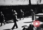 Image of busy city street with pedestrian traffic Detroit Michigan USA, 1926, second 31 stock footage video 65675030056