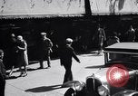 Image of busy city street with pedestrian traffic Detroit Michigan USA, 1926, second 32 stock footage video 65675030056