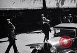Image of busy city street with pedestrian traffic Detroit Michigan USA, 1926, second 33 stock footage video 65675030056