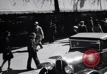 Image of busy city street with pedestrian traffic Detroit Michigan USA, 1926, second 34 stock footage video 65675030056