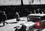 Image of busy city street with pedestrian traffic Detroit Michigan USA, 1926, second 37 stock footage video 65675030056