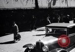 Image of busy city street with pedestrian traffic Detroit Michigan USA, 1926, second 38 stock footage video 65675030056