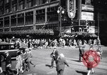 Image of busy city street with pedestrian traffic Detroit Michigan USA, 1926, second 46 stock footage video 65675030056