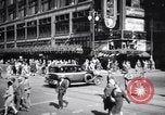 Image of busy city street with pedestrian traffic Detroit Michigan USA, 1926, second 47 stock footage video 65675030056