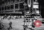 Image of busy city street with pedestrian traffic Detroit Michigan USA, 1926, second 48 stock footage video 65675030056