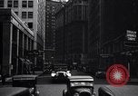 Image of busy city street with pedestrian traffic Detroit Michigan USA, 1926, second 56 stock footage video 65675030056