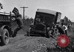 Image of truck stuck in mud United States USA, 1920, second 18 stock footage video 65675030095
