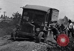 Image of truck stuck in mud United States USA, 1920, second 20 stock footage video 65675030095
