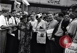 Image of milling crowd Dearborn Michigan USA, 1938, second 28 stock footage video 65675030135