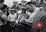 Image of milling crowd Dearborn Michigan USA, 1938, second 61 stock footage video 65675030135