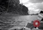 Image of natives in canoes Devil's Island French Guiana, 1939, second 3 stock footage video 65675030237