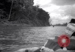 Image of natives in canoes Devil's Island French Guiana, 1939, second 5 stock footage video 65675030237