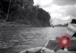 Image of natives in canoes Devil's Island French Guiana, 1939, second 6 stock footage video 65675030237