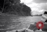 Image of natives in canoes Devil's Island French Guiana, 1939, second 7 stock footage video 65675030237