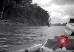 Image of natives in canoes Devil's Island French Guiana, 1939, second 8 stock footage video 65675030237