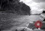 Image of natives in canoes Devil's Island French Guiana, 1939, second 9 stock footage video 65675030237