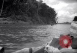 Image of natives in canoes Devil's Island French Guiana, 1939, second 10 stock footage video 65675030237