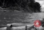 Image of natives in canoes Devil's Island French Guiana, 1939, second 13 stock footage video 65675030237