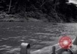 Image of natives in canoes Devil's Island French Guiana, 1939, second 14 stock footage video 65675030237