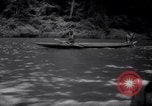 Image of natives in canoes Devil's Island French Guiana, 1939, second 17 stock footage video 65675030237