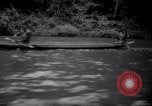 Image of natives in canoes Devil's Island French Guiana, 1939, second 18 stock footage video 65675030237