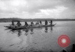 Image of natives in canoes Devil's Island French Guiana, 1939, second 22 stock footage video 65675030237