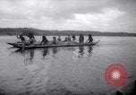 Image of natives in canoes Devil's Island French Guiana, 1939, second 23 stock footage video 65675030237